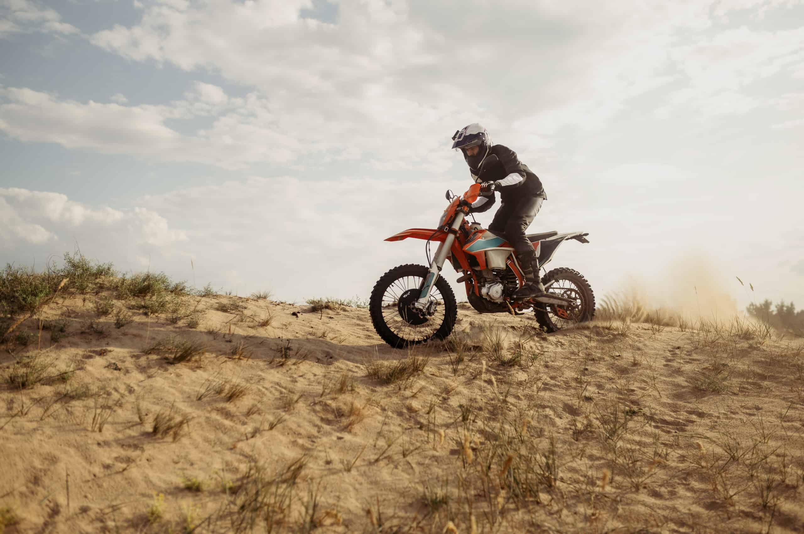 rider on sandy hill