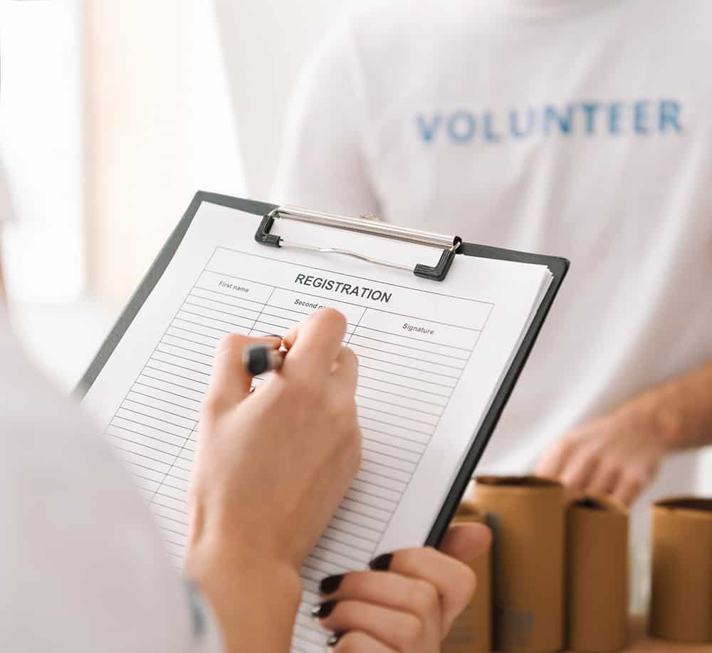 volunteer registering participants
